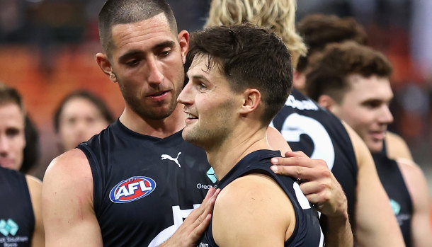 Jacob Weitering congratulates Nic Newman (right) after Saturday’s win over the Giants.