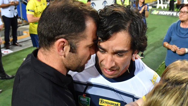 Old boys: Cameron Smith whispers to Johnathan Thurston in a touching gesture on the Gold Coast.