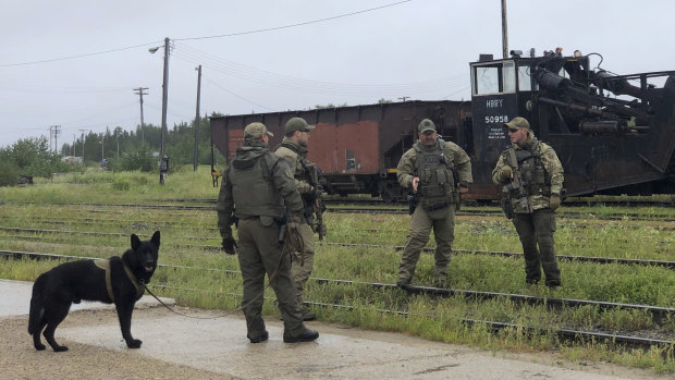 Soldiers search trains in Gillam.