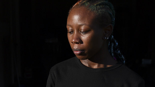 Dazia Lee, 20, outside her home in Charlotte on Monday. 