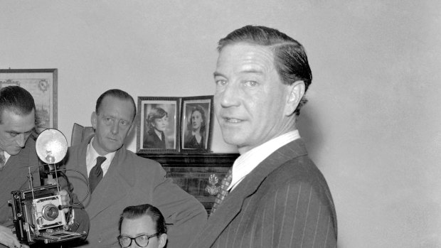 Former British diplomat and journalist Harold "Kim" Philby faces the media at his parents' London house in 1955.