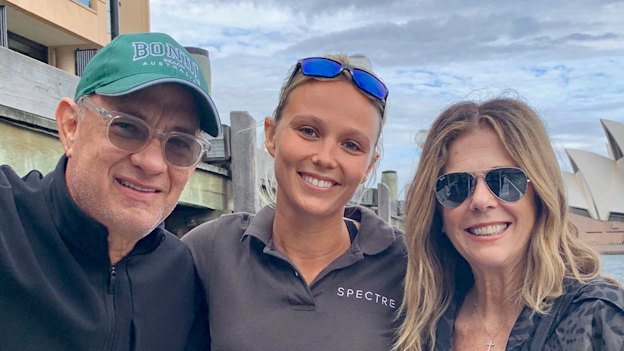 Tom Hanks and Rita Wilson with Elodie Dalgleish from Sydney Harbour Boat Tours. The Hollywood couple's COVID-19 diagnosis shut the family business down. 