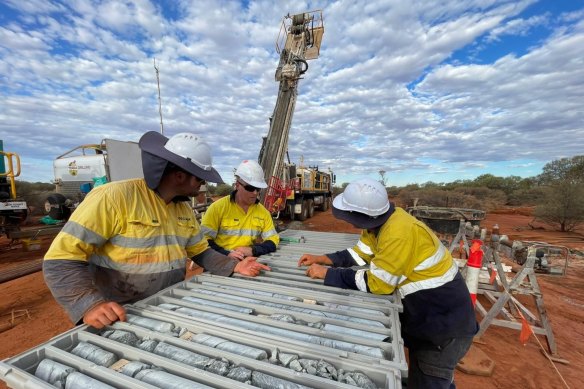Inspecting drill cores at Strickland Metals’ Horse Well gold project near Wiluna in WA.