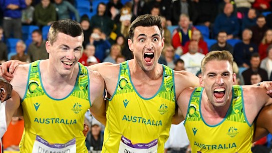 Alec Diamond and Daniel Golubovic and Cedric Dubler after their decathlon. 