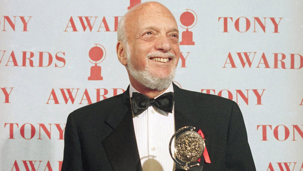 Harold Prince holds his Tony award for best director of a musical in 1995.