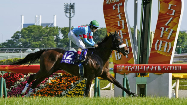 Almond Eye, ridden by Christophe Lemaire, wins the Victoria Mile turf race in Tokyo on May 17, 2020.