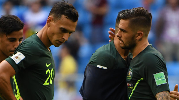Old firm: Trent Sainsbury and Josh Risdon on the world stage, after the Denmark draw.