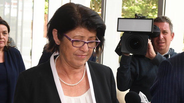 Magistrate Dominique Burns leaves the Supreme Court building in Sydney on Monday.