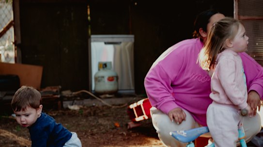 Nova and Atlas Pearce play in their front yard in Broken Hill. The town’s Indigenous children have blood lead levels double those of the general population.