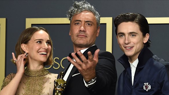 Adapted screenplay Oscar winner Taika Waititi (centre), with Natalie Portman and Timothee Chalamet, at the Oscars.