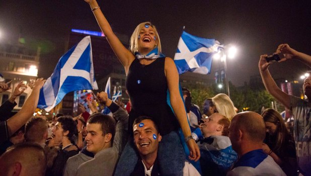 Supporters of the yes vote wait for the result of Scotland's September 2014 independence referendum. 