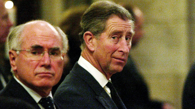Then Australian prime minister John Howard and then-prince Charles pray at Southwark Cathedral for the Bali bombing victims in February, 2003.