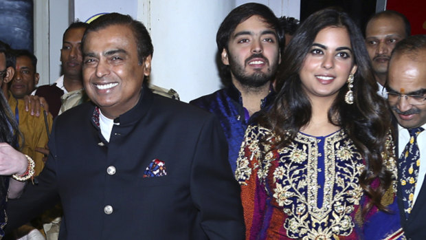 Mukesh Ambani and daughter Isha Ambani, whose "big, fat Indian wedding" is set to cost $139 million.