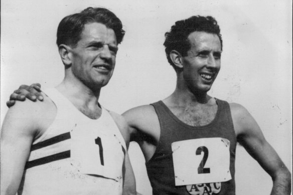 John Landy (right) after setting a new world record in Finland.