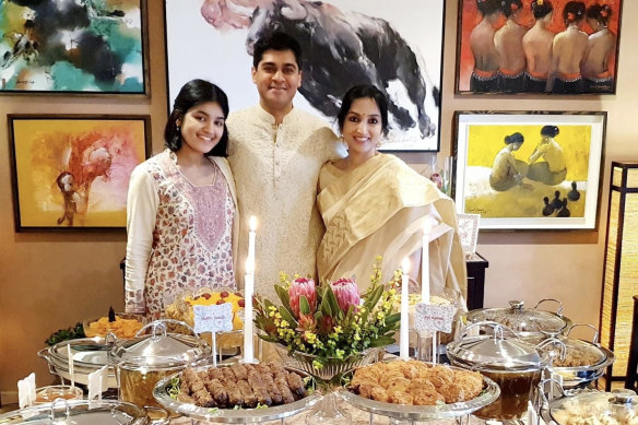 Ahelee Rahman and her parents celebrate Eid in 2022.
