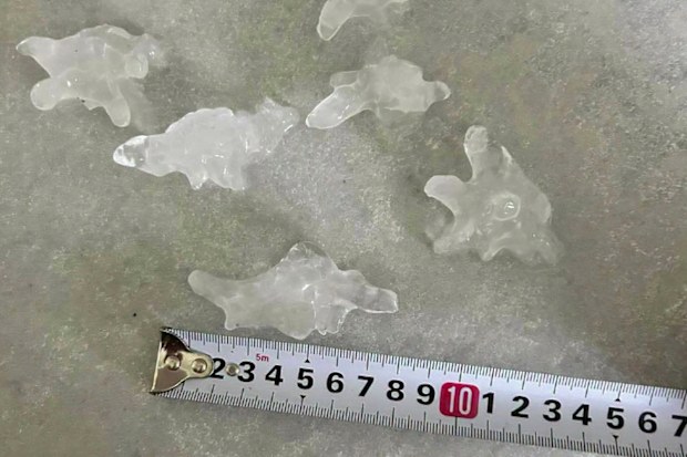 Ice nuggets measured up to seven centimetres and hammered cars in the suburb of Mudgeeraba.