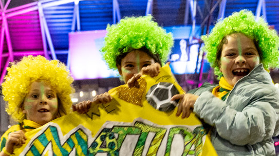 Friends Isla, Amelia and Amelia from North Turramurra have fun as fans arrive for the opening FIFA Women’s World Cup match between Australia and Ireland.