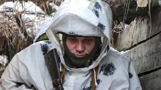 A pro-Russian militant manning a frontline in Ukraine’s occupied eastern territory. 