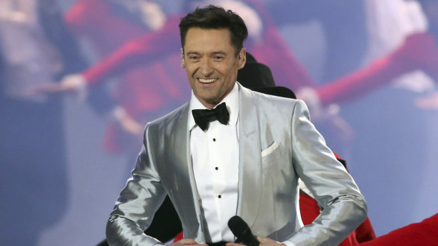 Hugh Jackman performs onstage at the Brit Awards.