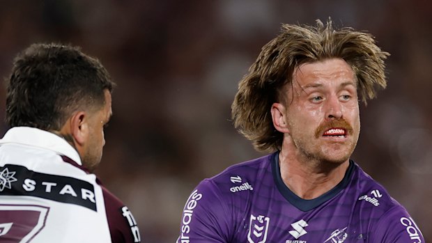 Cameron Munster throws a pass during the 2025 NRL grand final.