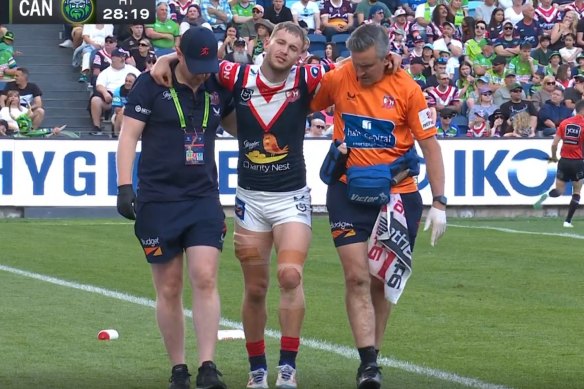 Sam Walker was helped off the field with a possible ACL injury.