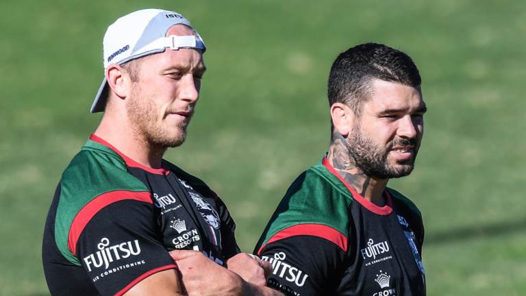 Ruled out: Jason Clark (left) alongside Adam Reynolds at Souths training.