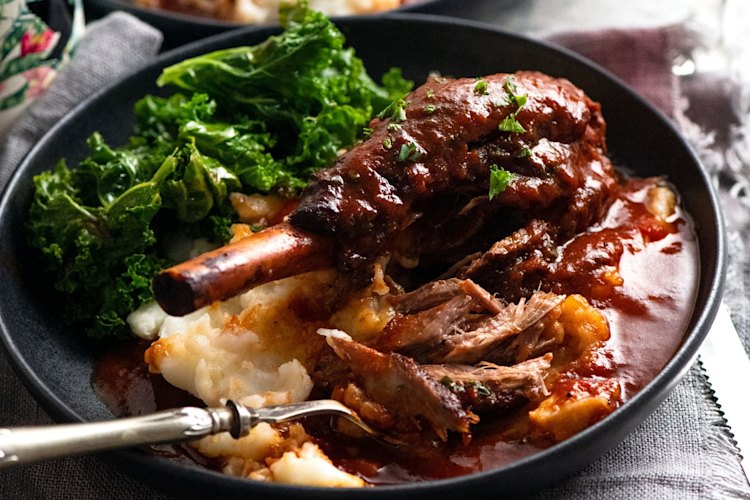Lamb shanks in red wine sauce.
