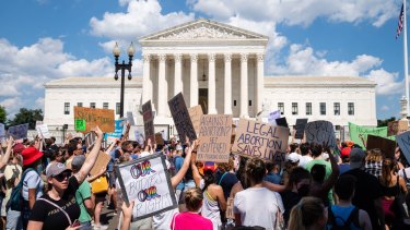 Abortion rights demonstrators chant outside the US Supreme Court in Washington DC on Saturday June 25, 2022.