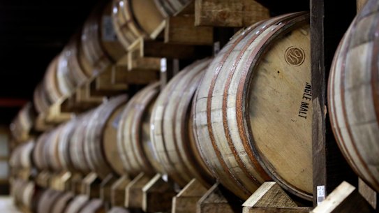 Bourbon barrels in an ageing warehouse at the James B. Beam distillery in Clermont, Kentucky.
