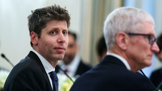 Sam Altman, CEO of OpenAI (left), and Tim Cook, Apple’s CEO, during a dinner with tech leaders at the White House in September.