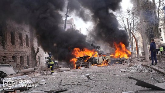 Firefighters put out the fire following Russia’s missile attack in Sumy, Ukraine.