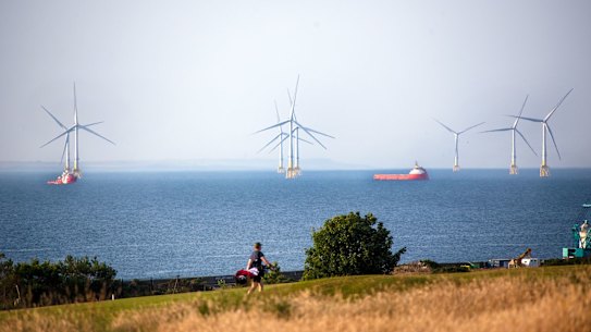 The Aberdeen Bay Wind Farm, beyond the Nigg Bay Golf Club in Aberdeen, Scotland.