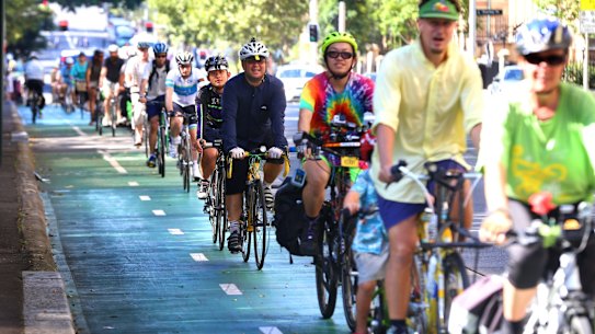 SYDNEY, AUSTRALIA - FEBRUARY 08: Cyclists take to the green cycle paths on College Street in Sydney's CBD to defend their use and practicality despite encourage State Government plans to abolish them on February 8, 2015 in Sydney, Australia. (Photo by James Alcock/Fairfax Media)