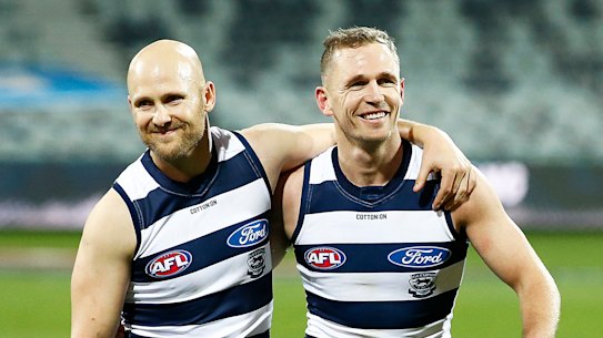 GEELONG, AUSTRALIA - JULY 04: Joel Selwood of the Cats and Gary Ablett of the Cats walk off together after playing their 300th and 350th games respectively after the round 5 AFL match between the Geelong Cats and the Gold Coast Suns at GMHBA Stadium on July 04, 2020 in Geelong, Australia. (Photo by Daniel Pockett/Getty Images)