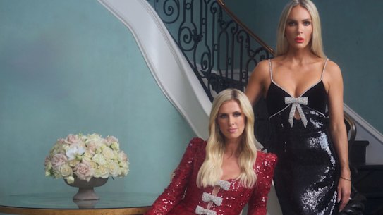 Nicky Hilton Rothschild and Rebecca Vallance-Gasan in pieces from their holiday collection collaboration for the Rebecca Valance label.