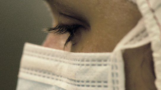 Frontline staff at many of Melbourne's major hospitals will now don surgical masks. 