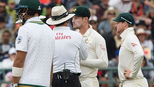 Dark day: Cameron Bancroft speaks with the umpire at Newlands in March.