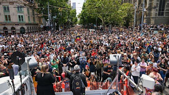 Professor Gary Foley addresses the huge crowd attending an Invasion Day rally in central Melbourne on Thursday.