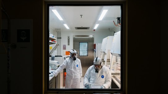 UNSW Medicineâs Kirby Institute, which has been retrofitted and is now fully equipped to study the live SARS-CoV-2 virus. Photo shows Stuart Turville, Associate Professor at the Kirby Institute, working within the PC3 Lab. Photographed Wednesday 19th May 2021. Photograph by James Brickwood. SMH NEWS 210519. CORONAVIRUS. COVID-19