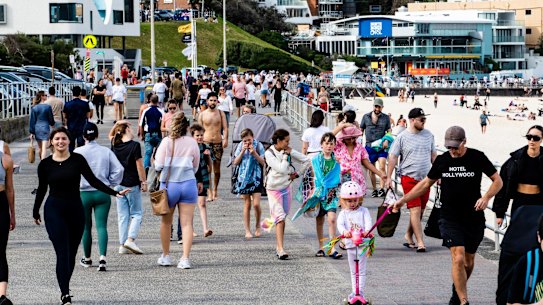 People enjoying the warm weather at Bondi Beach. 1st August 2021. Photo: Edwina Pickles / SMH