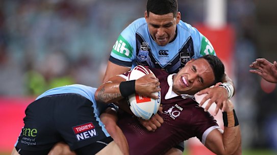 SYDNEY, AUSTRALIA - NOVEMBER 11:  Valentine Holmes of the Maroons is tackled during game two of the 2020 State of Origin series between the New South Wales Blues and the Queensland Maroons at ANZ Stadium on November 11, 2020 in Sydney, Australia. (Photo by Mark Kolbe/Getty Images)