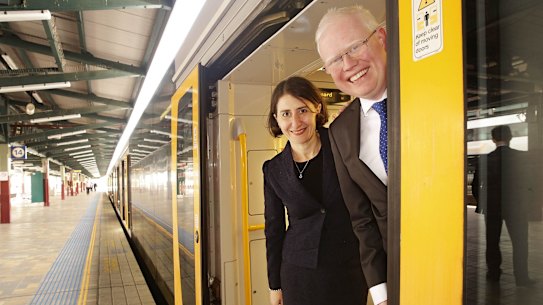 SYDNEY, AUSTRALIA - NOVEMBER 06: Minister for Transport Gladys Berejiklian and the Member for Kiama Gareth Ward MP pose for a photo on platform 14 at Central station, on November 6, 2014 in Sydney, Australia. Extra train carriages are to be added to the Central to Kiama train service. (Photo by Jessica Hromas/Fairfax Media) *** Local Caption *** Gladys Berejiklian; Gareth Ward