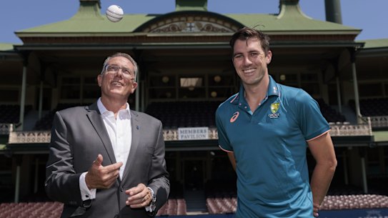Foxtel boss Patrick Delany [right], pictured with Pat Cummins played down the implications of Amazon’s cricket deal.