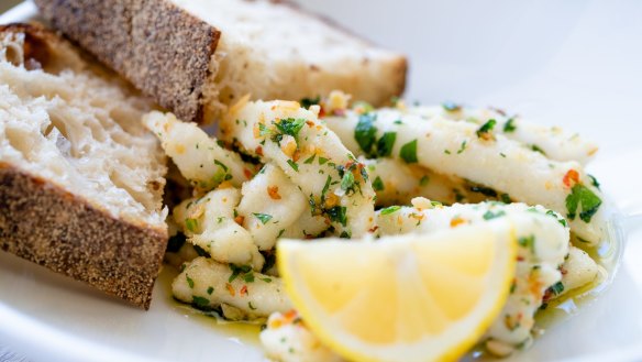 Calamari, garlic, chilli and olive oil with a hunk of AP Bakery bread at Fish Shop in Bondi.