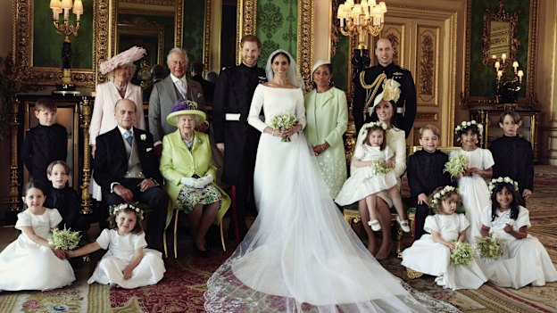 In good times and in bad: Prince Harry and Meghan, the Duchess of Sussex, surrounded by family on their wedding day. 