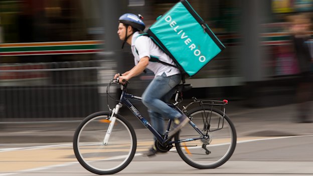 A Deliveroo rider.