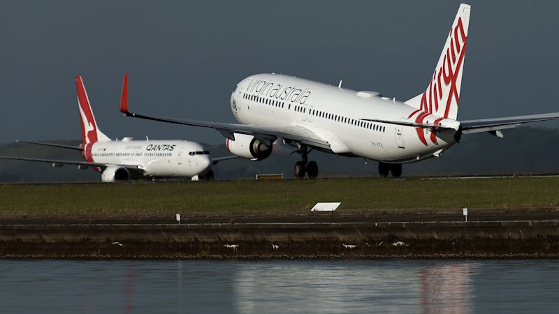 Virgin aborts take-off at Sydney airport as Qantas aircraft crosses runway