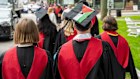 A Harvard University student wears a graduation cap with the Palestinian flag during commencement events in May.