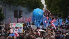 Protesters hold banners during a demonstration against the far-right and racism in central Paris, France, on Saturday, June 15.