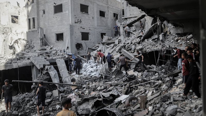 Gaza ceasefire is back on, Israel says, after new strikes kill more than 100